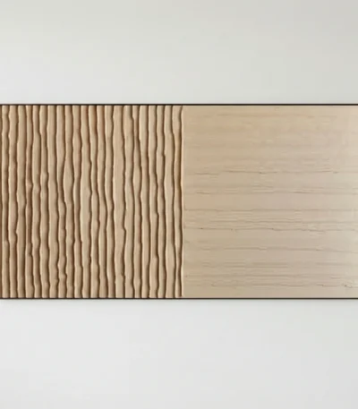 Minimalist hand-painted canvas with textured vertical striations in warm cream and natural wood tones, contemporary interior