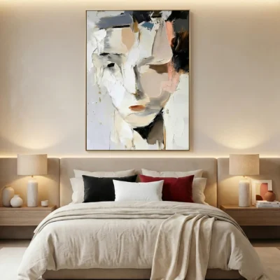 Expressionist hand-painted canvas depicting abstracted face in cream, white, and charcoal tones, contemporary bedroom