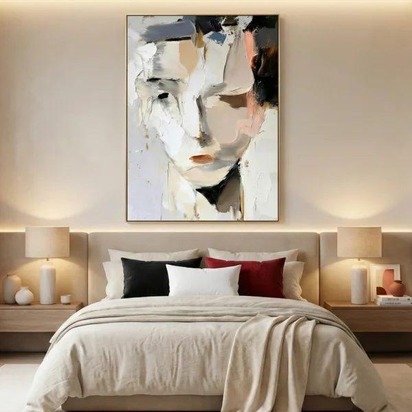 Expressionist hand-painted canvas depicting abstracted face in cream, white, and charcoal tones, contemporary bedroom