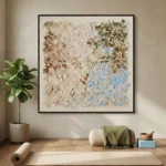Textured abstract hand-painted canvas in cream, sage, and soft blue tones with layered leaf-like brushstrokes, contemporary living space