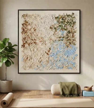 Textured abstract hand-painted canvas in cream, sage, and soft blue tones with layered leaf-like brushstrokes, contemporary living space