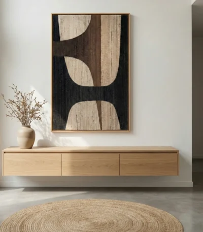 Abstract hand-painted canvas with organic curved shapes in charcoal, cream and taupe tones, modern entryway
