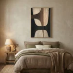 Minimalist abstract hand-painted canvas in cream and charcoal with organic curved cutouts, modern bedroom setting