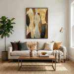 Layered abstract hand-painted canvas in warm earth tones and metallic gold, contemporary living space