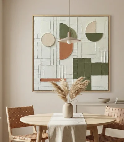 Abstract hand-painted canvas with geometric shapes in sage green, terracotta, and cream tones, contemporary dining space