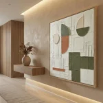 Contemporary abstract hand-painted canvas with geometric shapes in sage green, terracotta, and cream tones, modern entryway