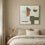 Contemporary abstract hand-painted canvas with geometric shapes in sage green, terracotta, and cream tones, modern bedroom