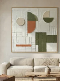 Textured abstract hand-painted canvas with geometric shapes in sage green, terracotta, and cream tones, contemporary living space