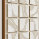 Twelve Curves textured wall art shown framed on the wall in a styled interior