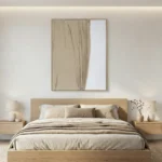 Minimalist abstract hand-painted canvas with draped fabric motifs in soft beige and cream tones, contemporary bedroom