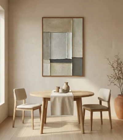 Minimalist abstract hand-painted canvas in layered cream and charcoal tones with geometric forms, contemporary dining space
