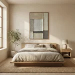 Minimalist abstract hand-painted canvas with geometric blocks in cream, beige, and charcoal tones, contemporary bedroom