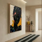 Gestural abstract expressionist hand-painted canvas with bold black, yellow, and coral brushstrokes, contemporary entryway