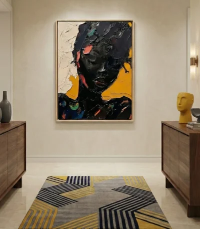 Contemporary expressionist portrait hand-painted canvas in bold blacks, yellows and coral tones, modern entryway