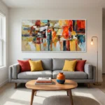 Gestural abstract expressionist hand-painted canvas in vibrant reds, oranges, and golds with dynamic layered brushstrokes, contemporary living space
