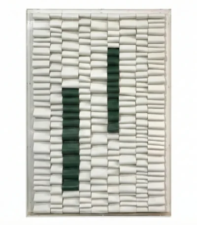 Minimalist hand-painted canvas with geometric cylinder pattern in cream and forest green, contemporary living space