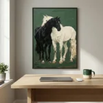 Contemporary figurative hand-painted canvas depicting two horses in cream and black against deep green, modern workspace
