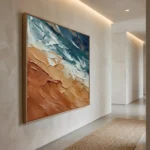 Textured abstract landscape hand-painted canvas in teal, cream, and terracotta depicting coastal waves and sandy shore, contemporary hallway