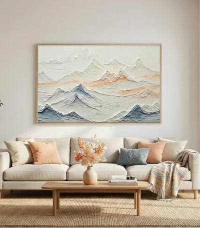 Textured landscape hand-painted canvas depicting layered mountains in soft grays, blues and warm ochre tones, contemporary living space