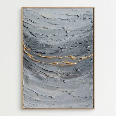 Textured abstract hand-painted canvas in layered grey tones with golden gestural brushstrokes, contemporary living space