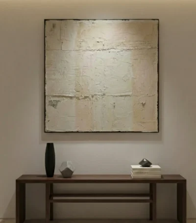 Textured minimalist hand-painted canvas in cream and off-white with subtle layered brushwork, contemporary entryway