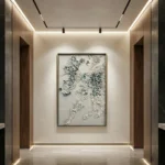 Textured hand-painted canvas depicting cascading botanical foliage in cream and soft green tones, contemporary hallway