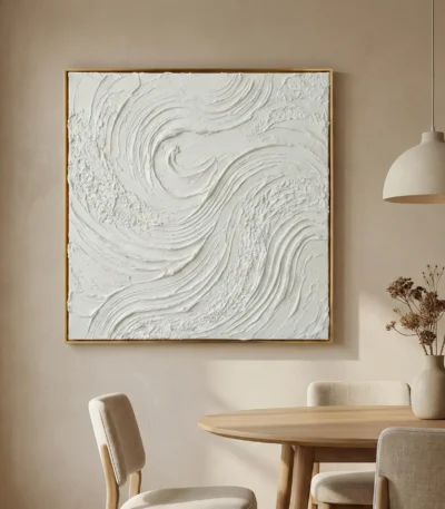 Textured abstract hand-painted canvas with swirling gestural brushstrokes in white and cream, contemporary dining space
