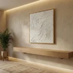Textured abstract hand-painted canvas with organic swirling patterns in cream and white tones, contemporary entryway