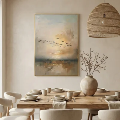 Impressionist landscape painting depicting sailboats and migrating birds over misty marshland in warm golden and neutral tones, contemporary dining space
