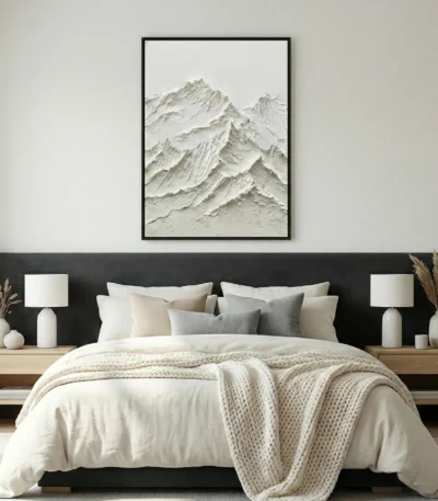 Textured monochrome hand-painted canvas depicting layered snow-capped mountain peaks in subtle relief, contemporary bedroom