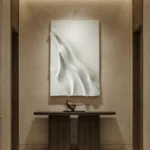 Textured abstract hand-painted canvas in flowing white and cream tones, contemporary entryway