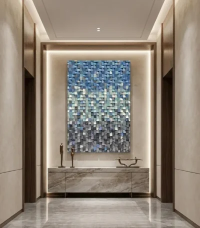 Textured abstract hand-painted canvas in gradient blue, cream, and charcoal pixelated squares, contemporary entryway