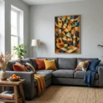 Cubist hand-painted canvas depicting musical instruments, clock faces, and wine glass in warm ochres, blues, and earth tones, contemporary living space