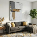 Textured abstract hand-painted canvas with layered cream, grey and ochre tones depicting peeling plaster, contemporary living space