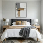 Textured abstract hand-painted canvas in cream, taupe, and ochre layered brushstrokes, modern bedroom