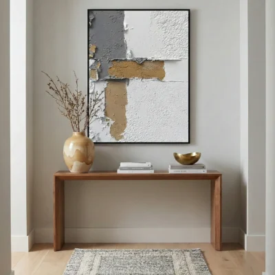 Textured abstract hand-painted canvas in cream, white and ochre with layered geometric forms, modern entryway