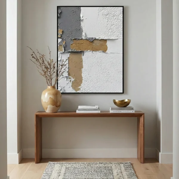 Textured abstract hand-painted canvas in cream, white and ochre with layered geometric forms, modern entryway