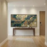 Layered abstract hand-painted canvas in swirling teal, gold, and cream tones, modern entryway