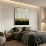 Textured abstract hand-painted canvas with layered white, gold, and black gestural strokes, modern bedroom
