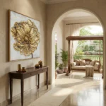 Textured gold leaf hand-painted canvas depicting a blooming peony in cream and ochre tones, contemporary entryway