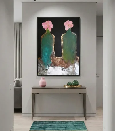 Contemporary hand-painted canvas featuring two weathered vessels with delicate pink flowers, layered in teal and sage green tones, entryway setting