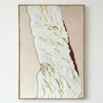 Textured abstract hand-painted canvas with dimensional white relief, gold leaf accents, and deep burgundy detail, contemporary living space