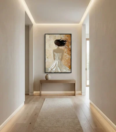 Contemporary figurative hand-painted canvas depicting woman in flowing white gown with dark flowing hair, warm cream and gold palette, modern hallway