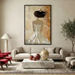 Textured figurative hand-painted canvas depicting woman in flowing white gown with black flowing hair, warm cream and gold palette, contemporary living space