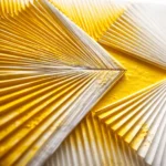 Textured abstract hand-painted canvas with layered gold and cream striations creating dynamic directional movement