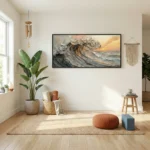 Textured seascape hand-painted canvas depicting turbulent ocean waves with golden sunset tones, contemporary living space