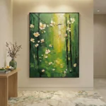 Gestural hand-painted canvas depicting cream flowers on dark branches against layered green and yellow brushstrokes, contemporary entryway