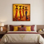 Contemporary figurative hand-painted canvas depicting four African women in red and blue garments holding vessels, warm ochre and gold tones, styled bedroom setting
