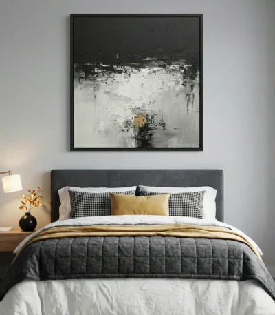 Contemporary abstract hand-painted canvas in gestural black, white and gold tones, modern bedroom