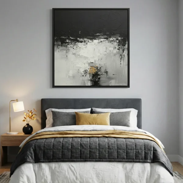 Contemporary abstract hand-painted canvas in gestural black, white and gold tones, modern bedroom